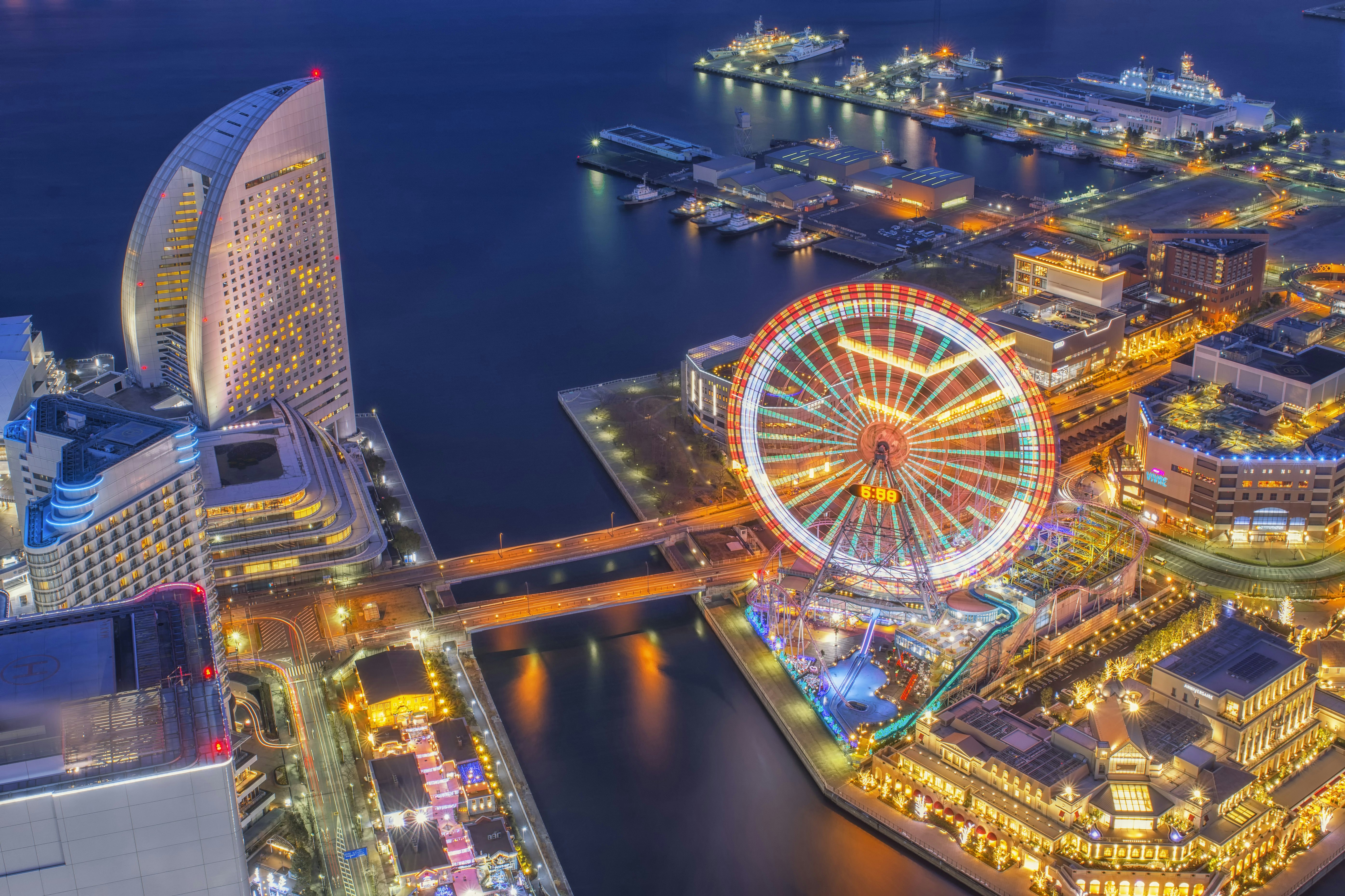Aerial of the Cosmo World amusement park in the Minato Mirai 21 district of Yokohama at night.