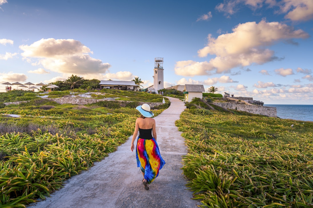 Woman walking in Punta Sur, Isla Mujeres, Mexico
