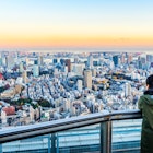 Asia Business concept for real estate and corporate construction - Tourists take shot of Tokyo Tower under bright golden sun and vivid twilight sky in Roppongi Hill, Tokyo, Japan License Type: media Download Time: 2022-01-07T13:43:08.000Z User: gwencotter Is Editorial: No purchase_order:
Adult, Building, City, Cityscape, Horizon, Male, Man, Nature, Outdoors, Person, Photography, Scenery, Sky, Urban