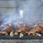 Jerk meat cooked over charcoal in Jamaica
