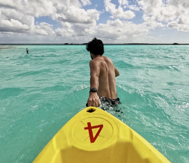 Tanned fit guy pulling a rented yellow kayak in clear light blue water. Cloudy sky. Bacalar lagoon. Quintana Roo. Mexico. Garmin watch on wrist.
2518332385
active,  activity,  bacalar,  background,  backpack,  backpackers,  beach,  beautiful,  boat,  canoe,  caucasian,  clouds,  freedom,  funny,  garmin,  happy,  holiday,  holidays,  kayak,  kayaking,  lagoon,  lake,  landscape,  lifestyle,  mangrove,  mexico,  nature,  overseas,  paradise,  sea,  summer,  swim,  swimming,  swimsuit,  swimwear,  travel,  vacation,  watch,  water,  yellow,  clear water,  cloudy sky,  good vibes,  light blue,  quintana roo,  Adult,  Back,  Horizon,  Male,  Man,  Nature,  Outdoors,  Person,  Sky,  Summer,  Swimming,  Water,  Water Sports,  Wristwatch
Tanned fit guy pulling a rented yellow kayak in clear light blue water. Cloudy sky. Bacalar lagoon. Quintana Roo. Mexico.