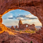 Turret arch through the North Window at Arches National Park in Utah License Type: media Download Time: 2023-04-14T12:35:08.000Z User: Norma.PrauseBrewer_LonelyPlanet Is Editorial: No purchase_order: