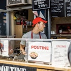 Montreal, Canada - May 28, 2017: Jean Talon market Poutine restaurant sign inside building closeup with chef in city in Quebec region; Shutterstock ID 670090774; purchase_order: 65050 - Digital Destinations and Articles; job: Lonely Planet Online Editorial; client: best poutine in Canada; other: Brian Healy
670090774
architecture, brunch, building, busy, cafe, canada, cheese, chef, city, closeup, color, colorful, curds, downtown, farmer, fast, food, fries, gravy, grocery, inside, interior, jean, jean-talon, lunch, man, many, marche, market, marketplace, menu, montreal, people, place, poutine, quebec, restaurant, sign, street, summer, talon, traditional, urban, young
Jean Talon market Poutine restaurant sign inside building closeup with chef in city in Quebec region
